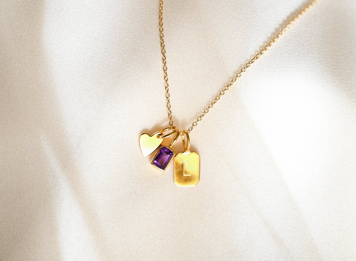 Ciondolo con iniziale e pietra natale in oro - Più pietre